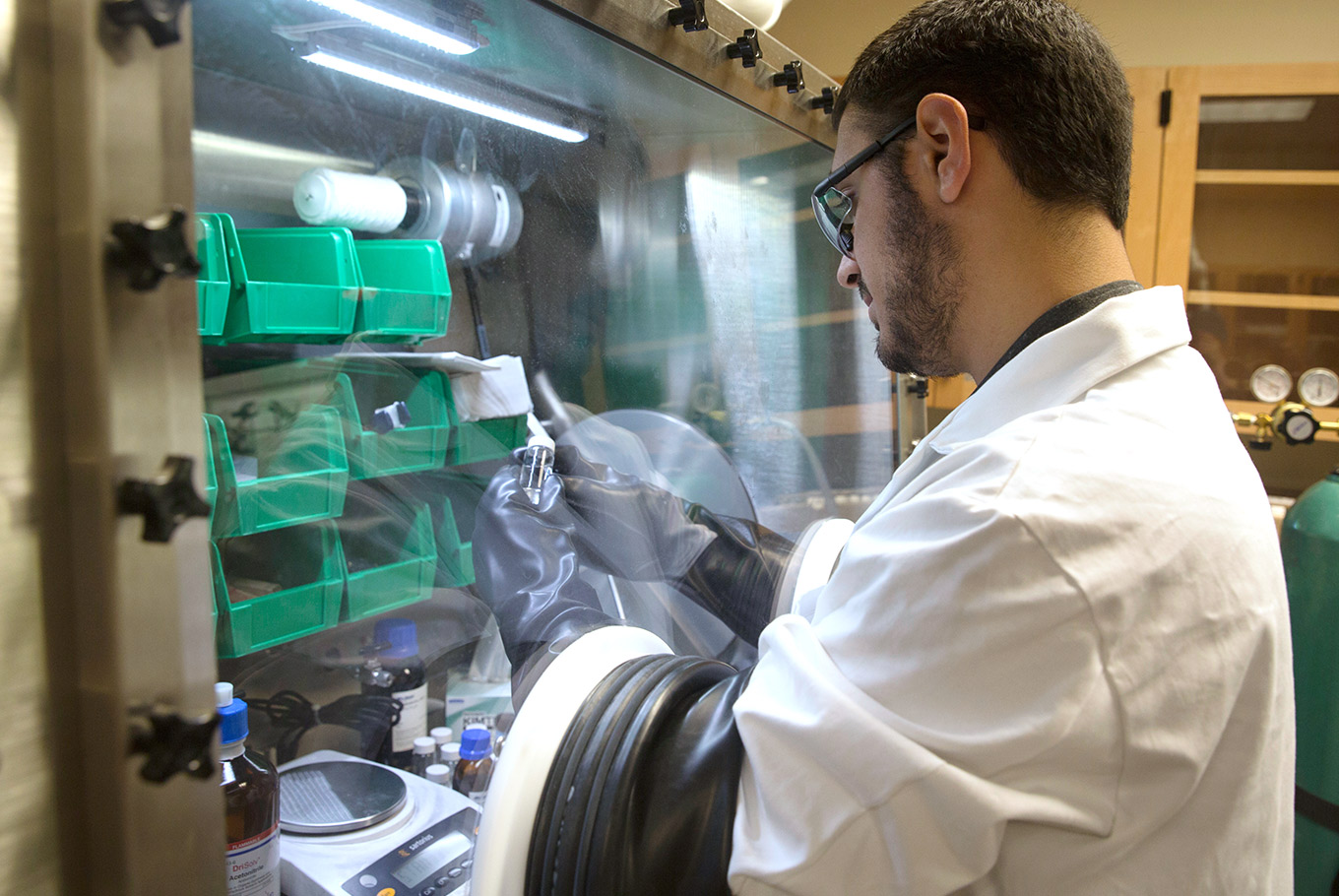 Male student works in a chemistry lab